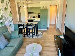 Appartements En sol'eau -Appartement a 50 m de la plage : photos des chambres