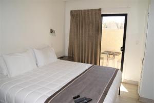 102 -Fully Furnished 1BR Suite-Prime Location