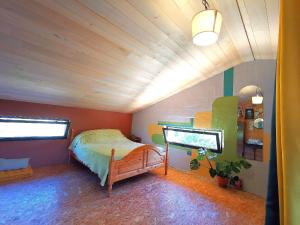 Maisons de vacances Maison d-artiste atypique en bordure de foret : photos des chambres