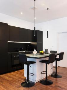 Appartements La Suite H : photos des chambres