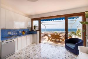 Appartamento Fronte Mare con Accesso Spiaggia