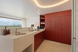 - Simona - Exclusief, architecturaal zeezicht app