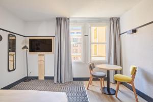 Appart'hotels Appart Hotel Odalys City Aix en Provence L'Atrium : photos des chambres