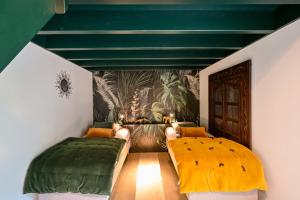 Maisons de vacances Bali Beach - Vue mer proche de la plage : photos des chambres