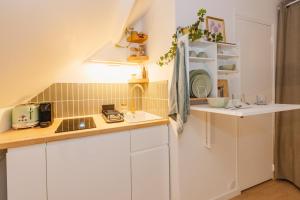 Appartements Le Petit Guehenno - A quelques pas du centre-ville : photos des chambres