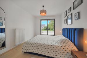 Maisons de vacances La Villa Sainghin - Piscine et Jacuzzi Prive : photos des chambres