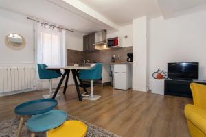 Appartements Le Studio des Songes - proche de la gare : photos des chambres