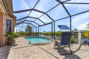 Heated Pool, Game Room, & Dock on Freshwater Canal - Mermaid Cove - Roelens