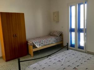 La casa dalle persiane blu