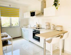 Villas Maison independante 52 m2, clim, wifi et jardin : photos des chambres