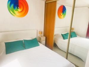 Villas Maison independante 52 m2, clim, wifi et jardin : photos des chambres