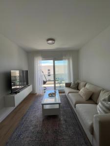 One-Bedroom Apartment with Private Beach Parking