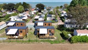 Campings Camping Ostrea **** : Bungalow Deluxe 2 Chambres - 4 Personnes