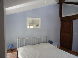 Maisons de vacances Maison de village avec piscine : photos des chambres
