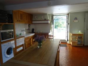 Maisons de vacances Maison de village avec piscine : photos des chambres