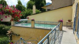 Maisons de vacances Maison de village avec piscine : photos des chambres