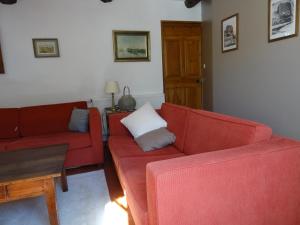 Maisons de vacances Maison de village avec piscine : photos des chambres