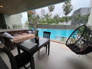 Beachfront Luxe with Pool Access and Terrace