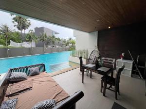 Beachfront Luxe with Pool Access and Terrace