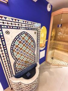 Appartements La Palmeraie & SPA Prive - Jacuzzi Hammam Sauna : photos des chambres