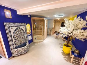 Appartements La Palmeraie & SPA Prive - Jacuzzi Hammam Sauna : photos des chambres