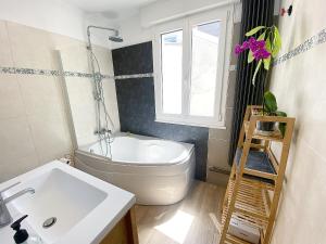Appartements Chez Clem - 3 chambres - garage prive - wifi - Netflix : photos des chambres