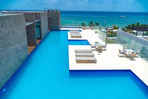Luxury 2 BR Condo with Private Jacuzzi & BBQ - At Cruz con Mar - Maricruz
