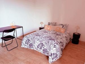 Appartements L-Occitan T2 a 10 minutes du coeur de Toulouse Parking prive et Metro : photos des chambres