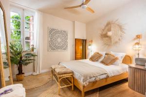 Appartements Le Jardin Secret - Suite Bali avec Balneo : photos des chambres