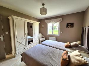 Maisons de vacances Holiday Home in Denneville by the Sea, cleaning included : photos des chambres