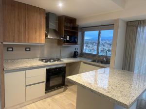 Departamento espectacular con balcón panorámico en piso alto