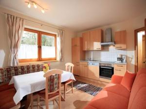 Apartment in Brixen im Thale with a garden, cleaning included