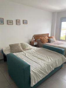 Becasina Patagonica A Luminoso monoambiente en Ushuaia con vista a las montañas