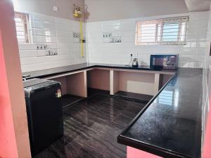 Vididhillu rooms and Service Apartment