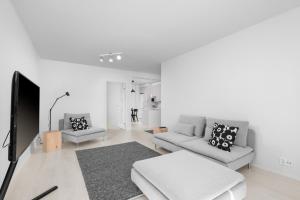 Kaupunkikolmio saunalla ja parvekkeella