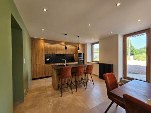 Maisons de vacances L-Escargot - Maison avec espace bien etre : photos des chambres