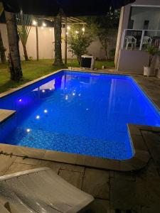 Casa com Piscina, Churrasqueira e Quartos amplos