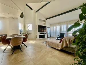 Penthouse de 170m2, 6 personnes avec jacuzzi et proche de Paris et Disney