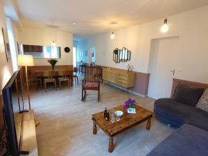 Appartements Grand Appartement avec Jardin Bretenoux : photos des chambres