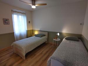 Appartements Grand Appartement avec Jardin Bretenoux : photos des chambres