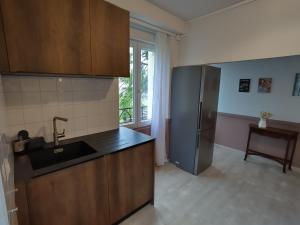 Appartements Grand Appartement avec Jardin Bretenoux : photos des chambres