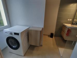 Appartements Grand Appartement avec Jardin Bretenoux : photos des chambres