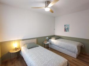 Appartements Grand Appartement avec Jardin Bretenoux : photos des chambres