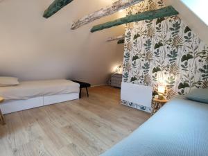 Maisons de vacances Maison en pierre avec piscine : photos des chambres
