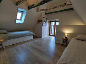 Maisons de vacances Maison en pierre avec piscine : photos des chambres