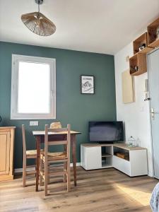 Appartements Petit cocon avec terrasse : photos des chambres