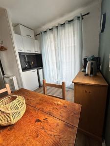 Appartements Petit cocon avec terrasse : photos des chambres
