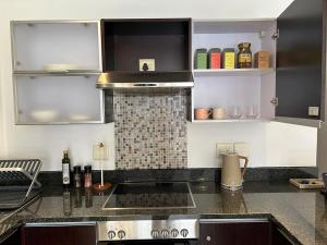 The Rockwell 1BR and OneFlow Yoga Club Access