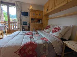 Appartements Charmant studio face a la Dent d-Oche : photos des chambres