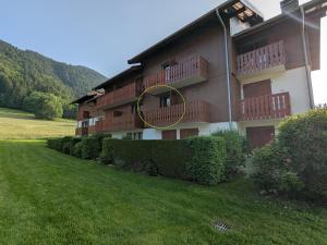 Appartements Charmant studio face a la Dent d-Oche : photos des chambres